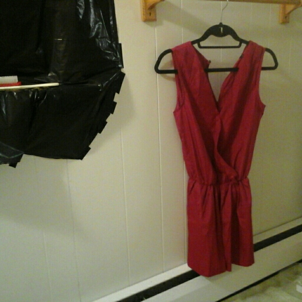 Red romper size (M) more like s/xs brand new