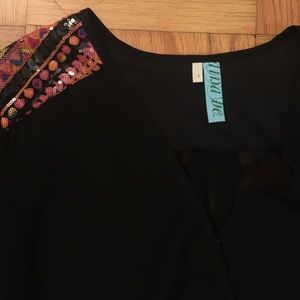 black top with neon sequins