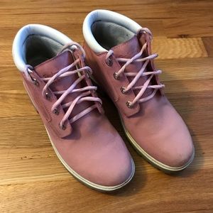 Waterproof pink Timberland boots.