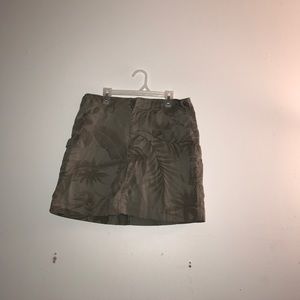 Olive mini skirt with floral design