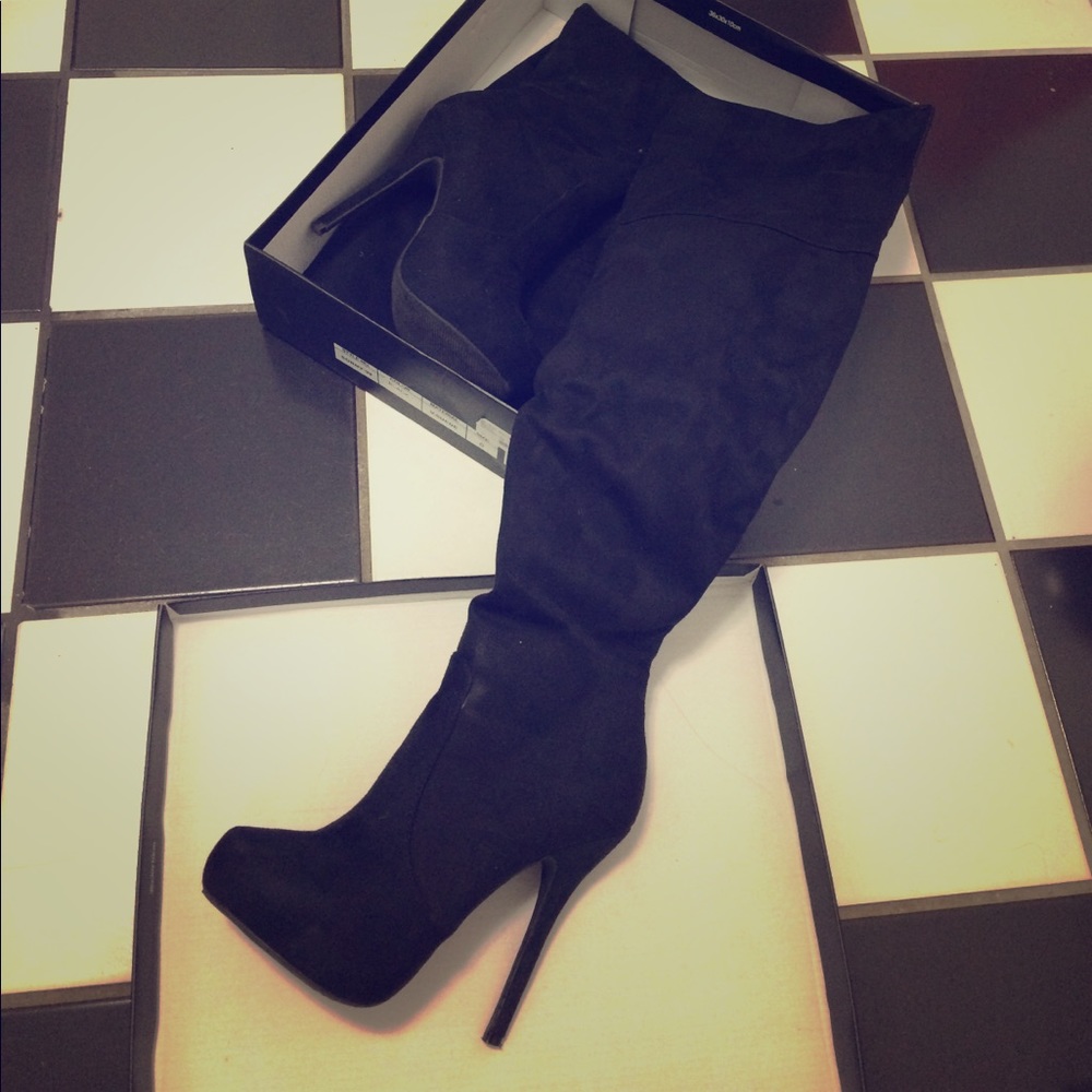 Black suede heeled thigh high boots