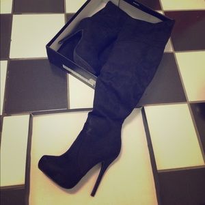 Black suede heeled thigh high boots