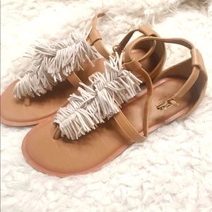Tassel fringe sandals in neutral