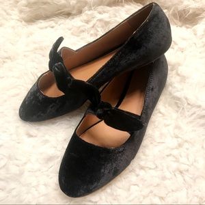 Urban Outfitters black velvet flats with bow