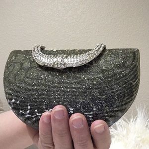 Metallic gray clutch with silver hardware