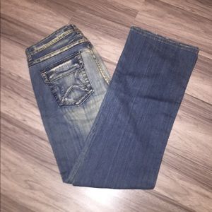 Never worn distressed denim jeans