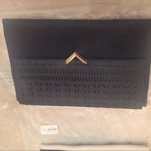 Stella and dot clutch