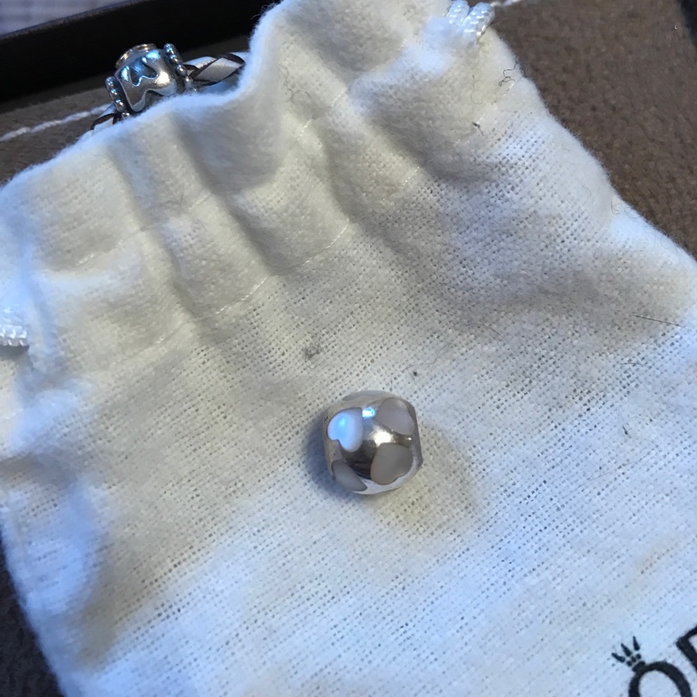 Pandora Mother of pearl heart charm.