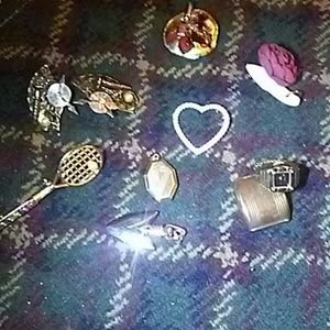 Odds and ends earrings finger watch locket and nec