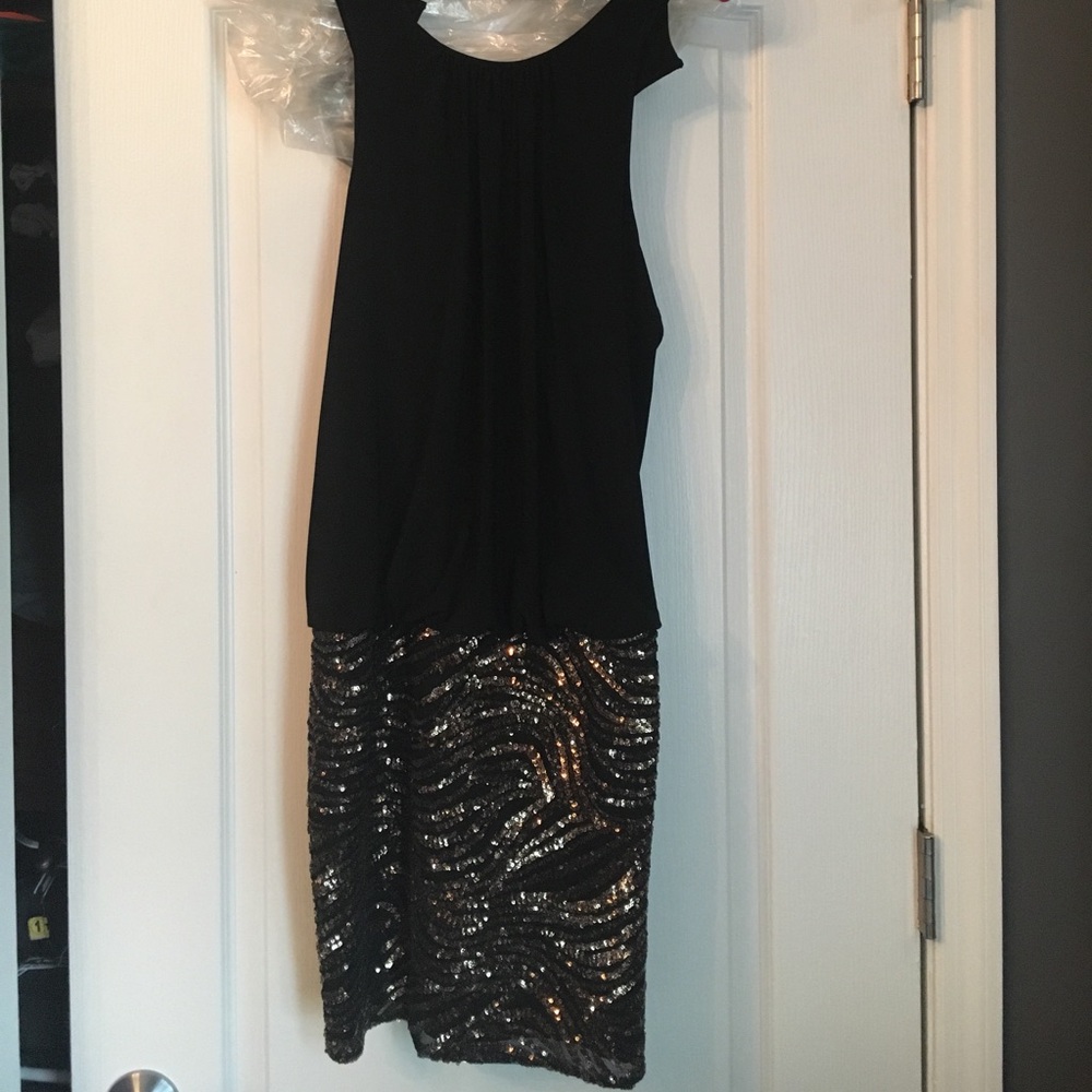 Short dress with sequin bottom
