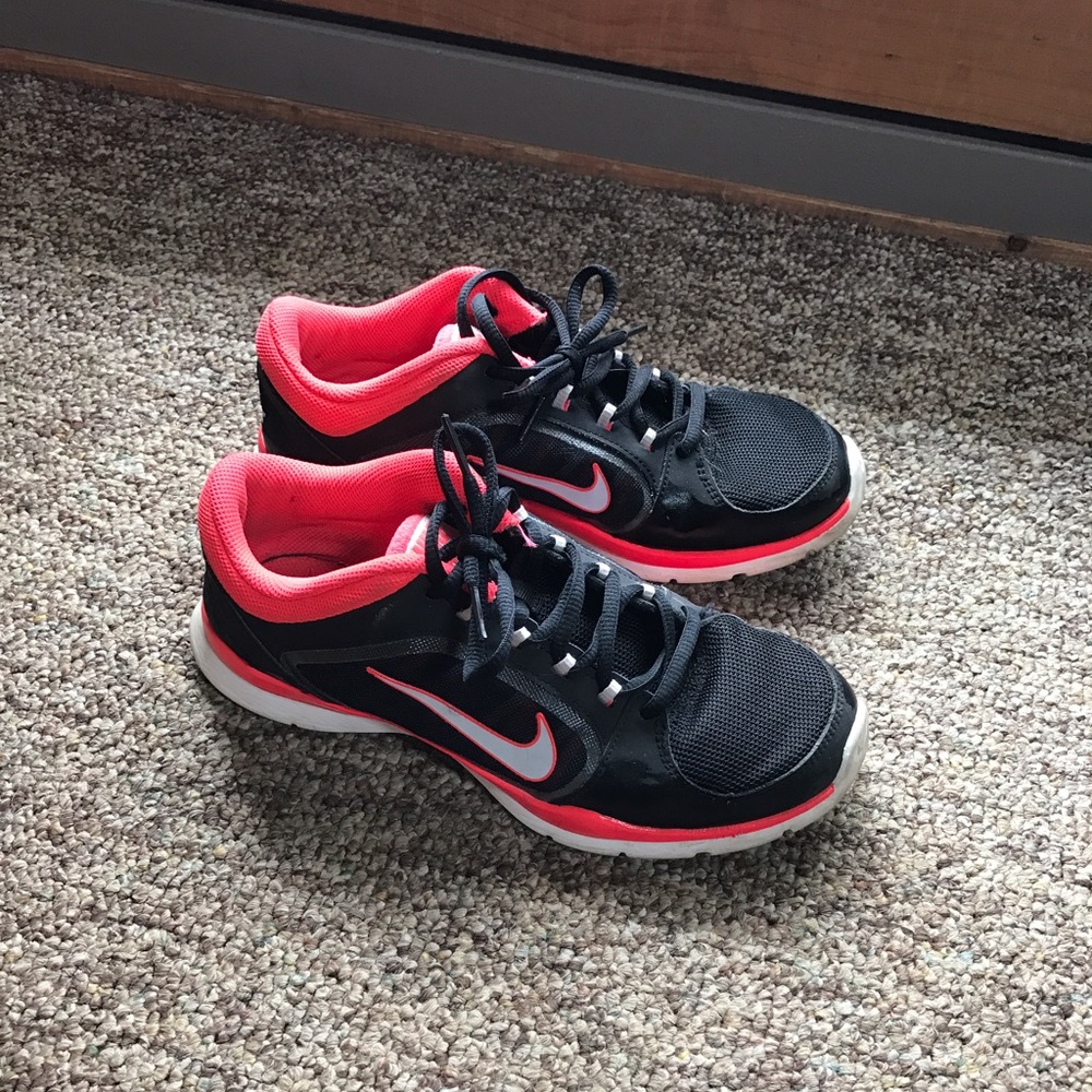 Women's pink and black nikes