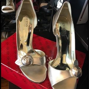 Women's Guess Gold Leather Heels.