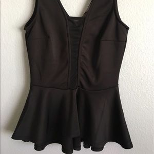 Peplum peek-a-boo top