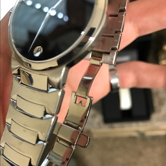 Movado watch with box and papers