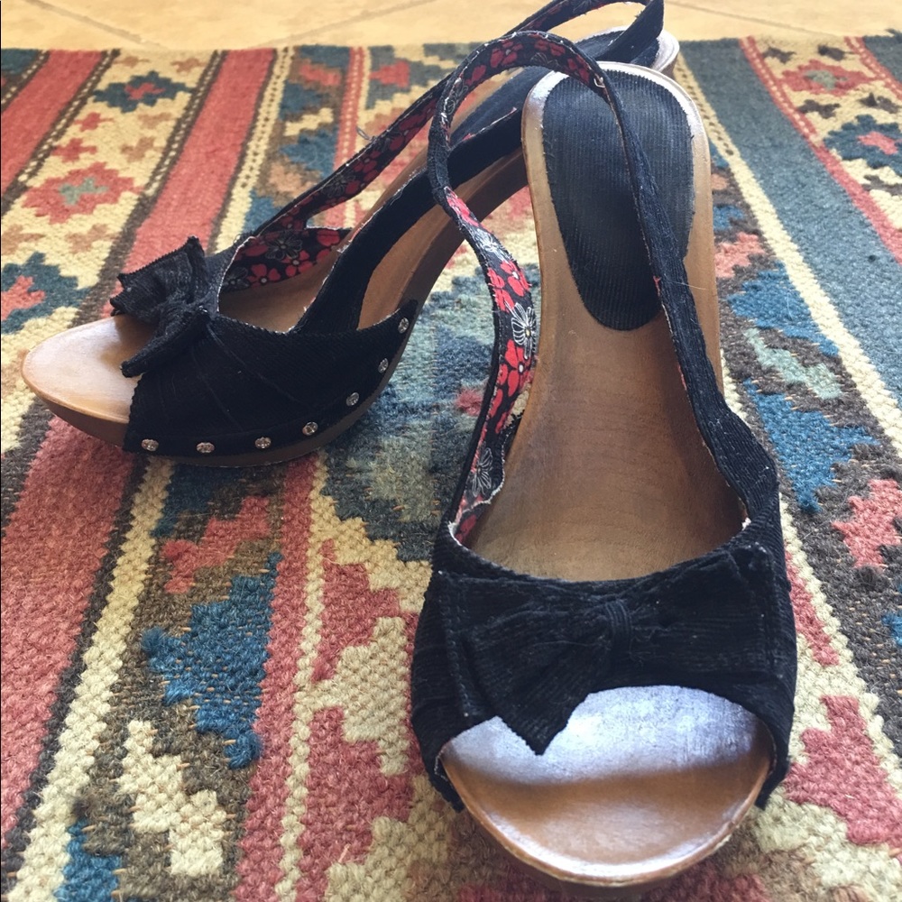 Black corduroy sling back heels.