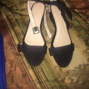 Never wore them. Flats w/ little heel
