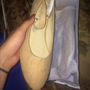 Nude flats . Never wore them.
