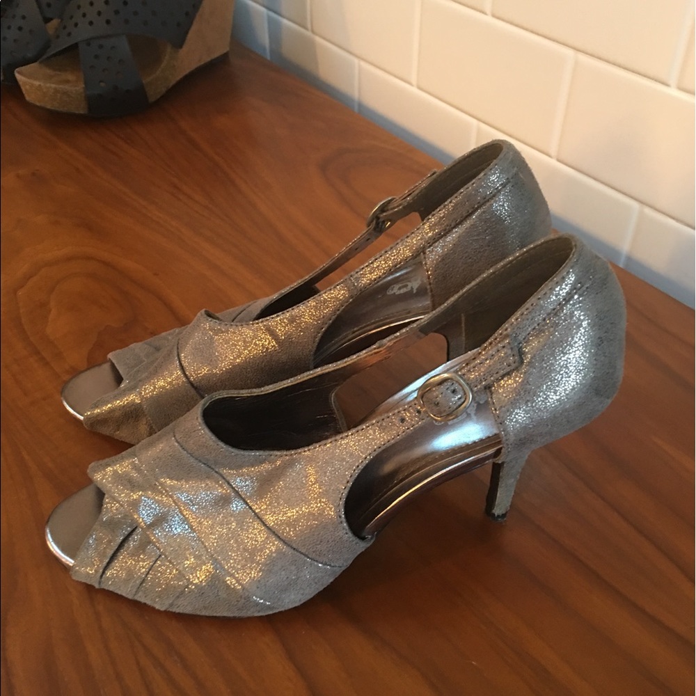 Coach silver heels, slightly worn. Size 8