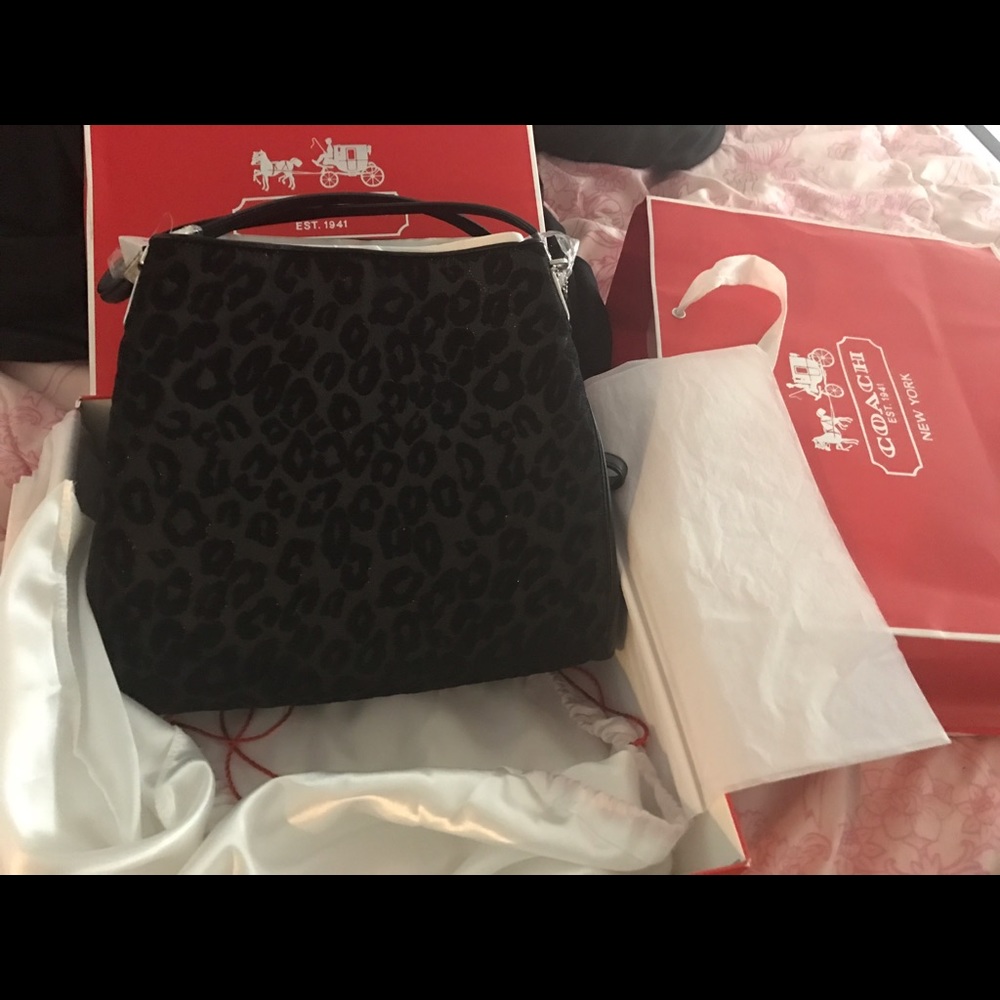Brand new coach leopard print original price 278