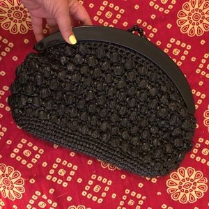 Retro black clutch made of recycled materials