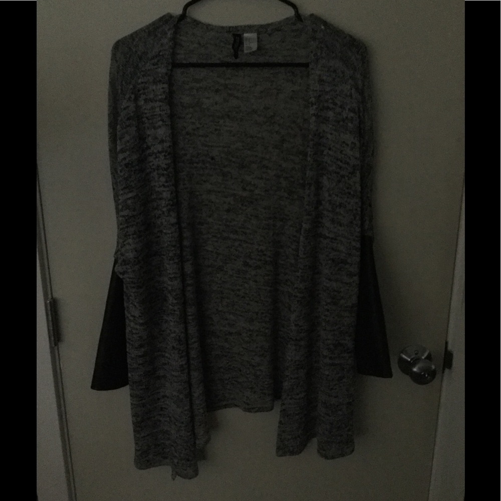 Grey sweater with leather sleeves