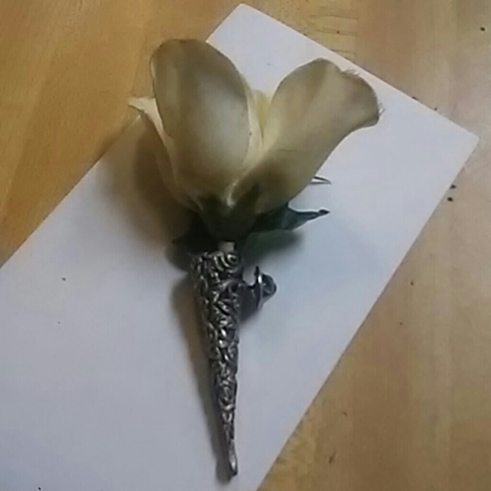 Very old corsage with original pen and