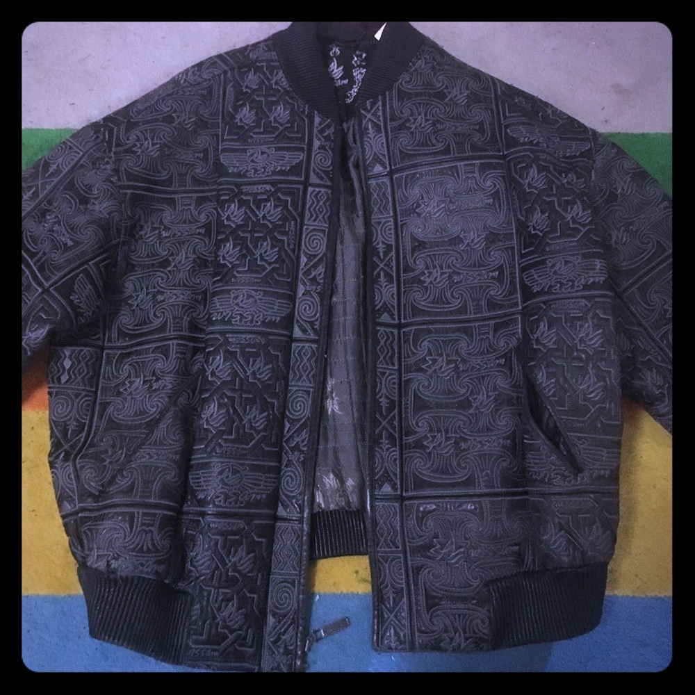 Al Wissam leather jacket with embroidered details