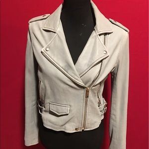 A lightly used letter midriff jacket