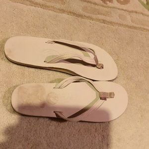 Rainbow tan flip flops
