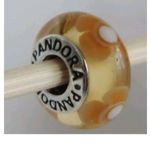 Pandora retired glass bead with yellow flowers