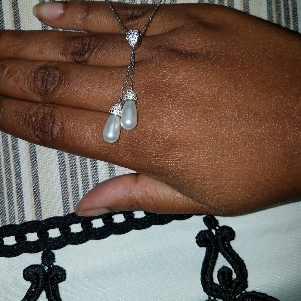 silver necklace with pearls and diamonds