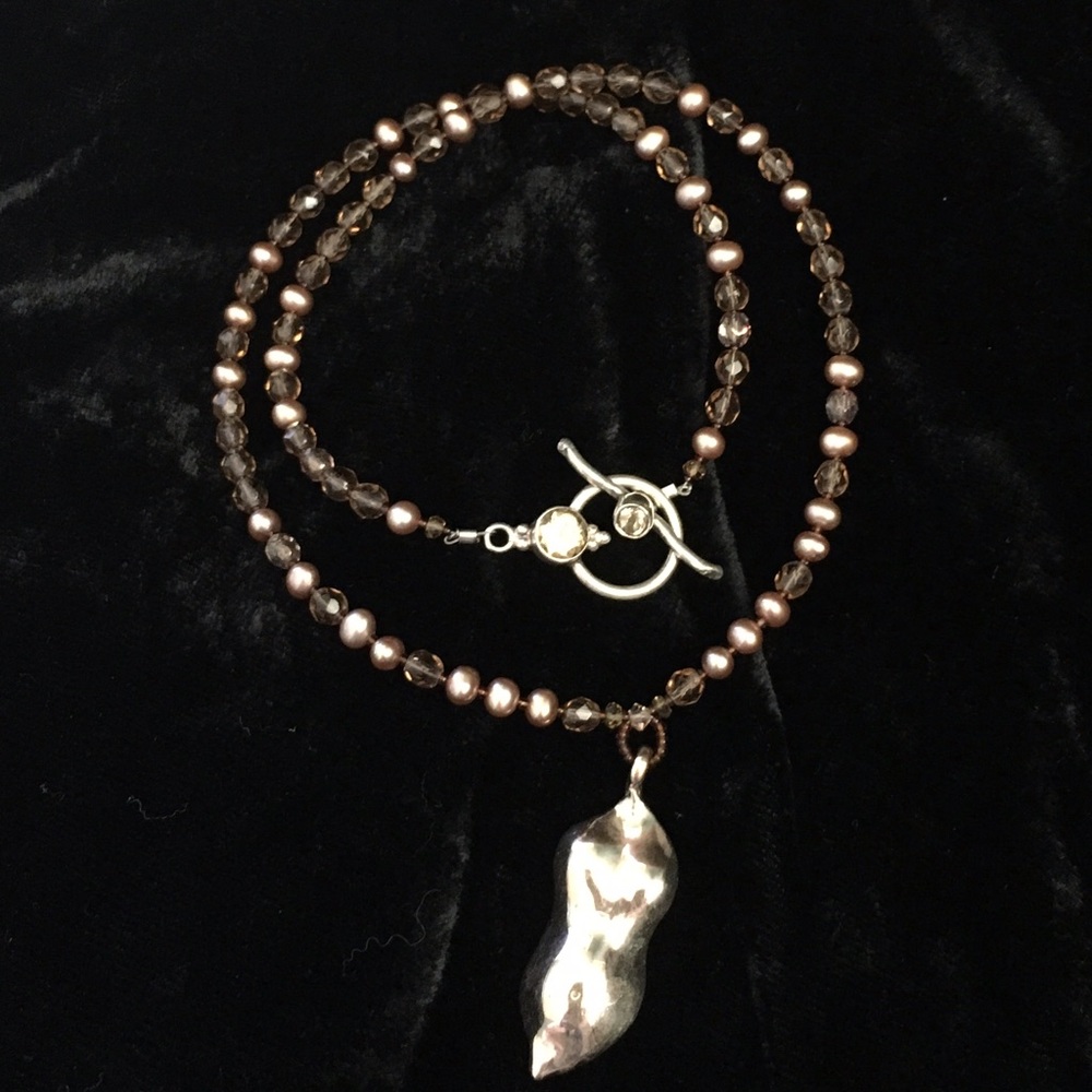 Bronze Goddess Pendant on Pearl Necklace