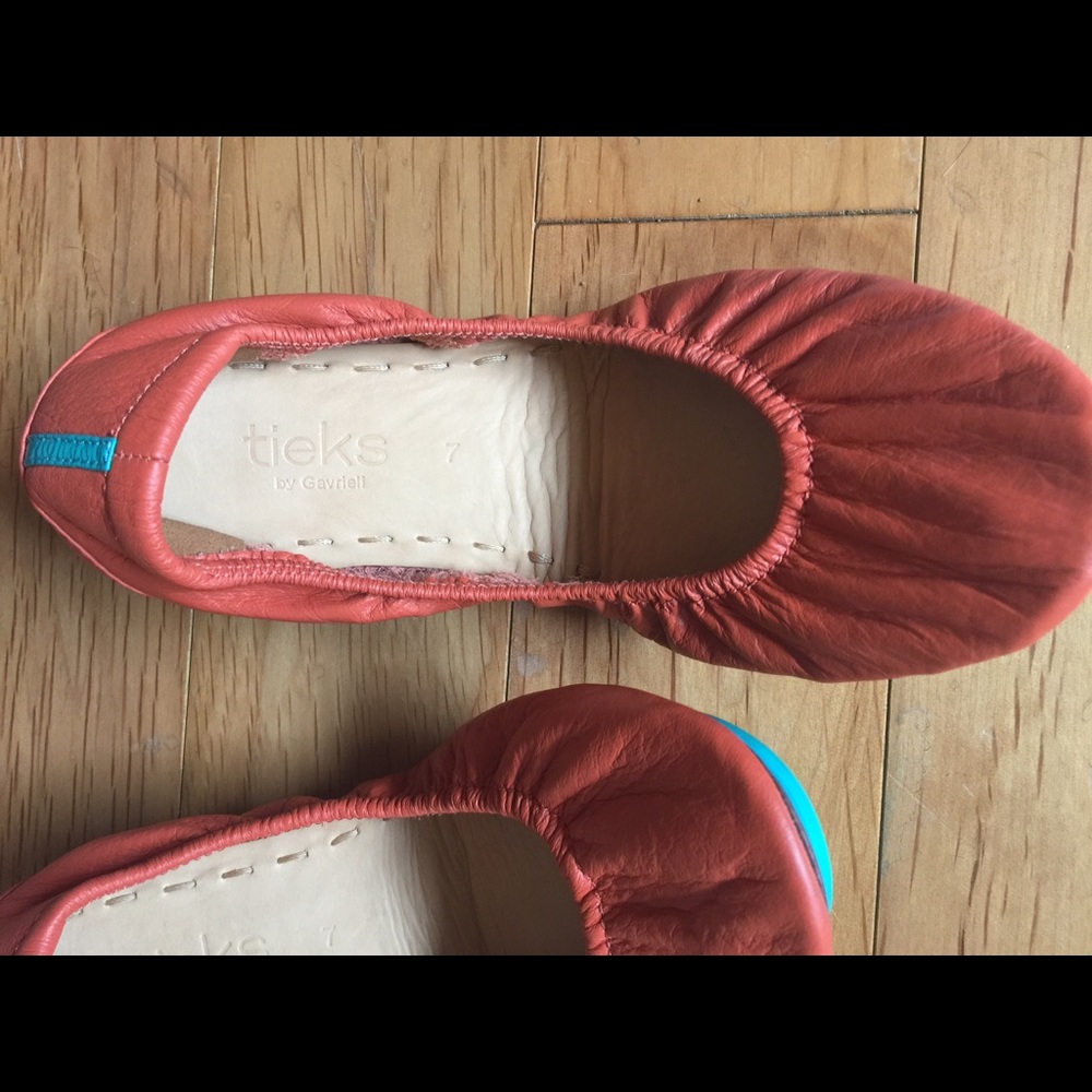 Brand new orange Tieks size 7