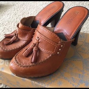 Michael Kors mules with wooden heels and tassels