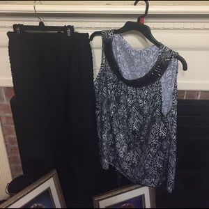 Knee length black skirt; matching top