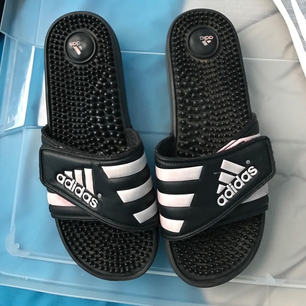 Adidas flip flops.