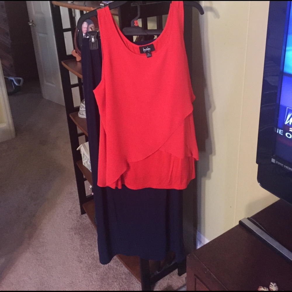 Navy blue maxi; bright orange top