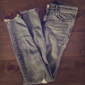 Grey torn jeans