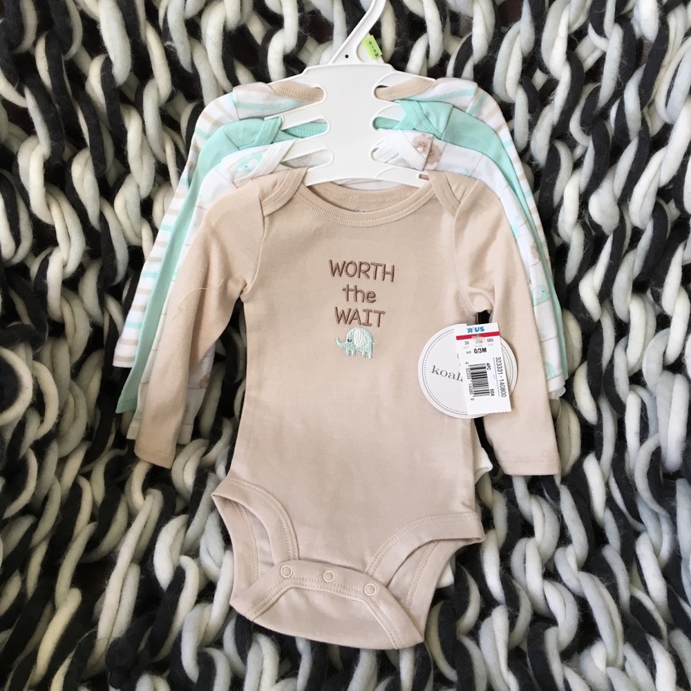 4 baby onesies 0-3