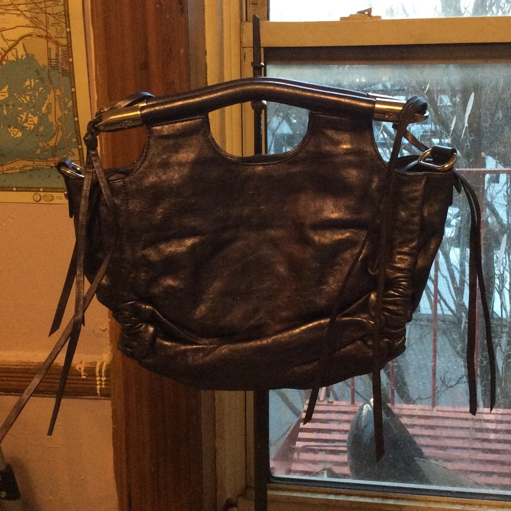 Awesome except inside metallic fringe purse