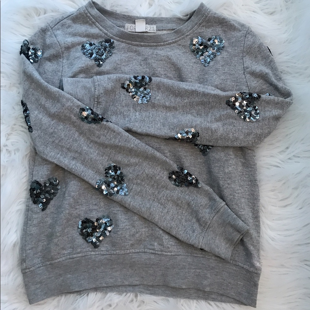 Super adorable sweater with heart sequence