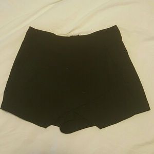 Asymmetrical black skort