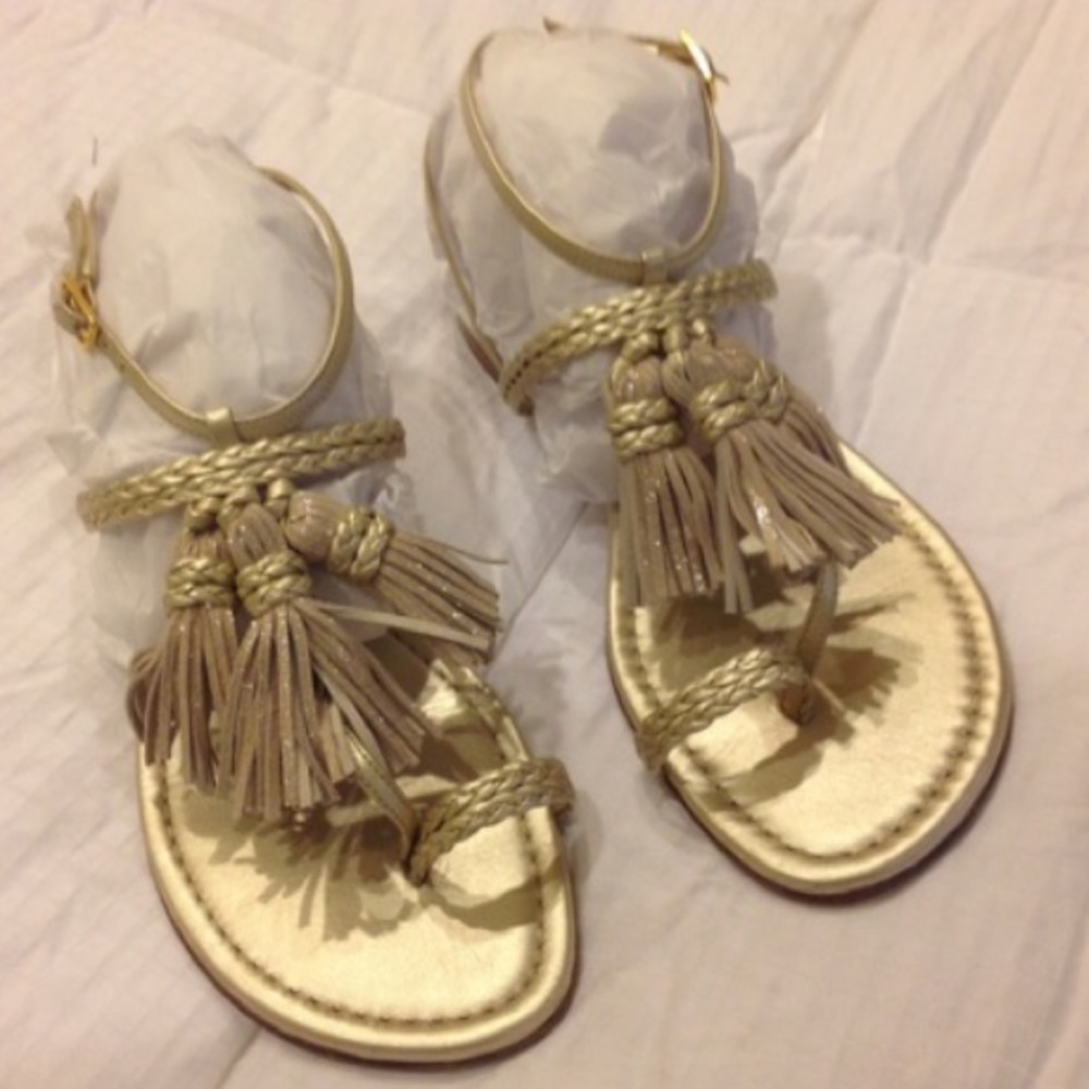 Donating tomorrow Stuart Weitzman Gold tasseled