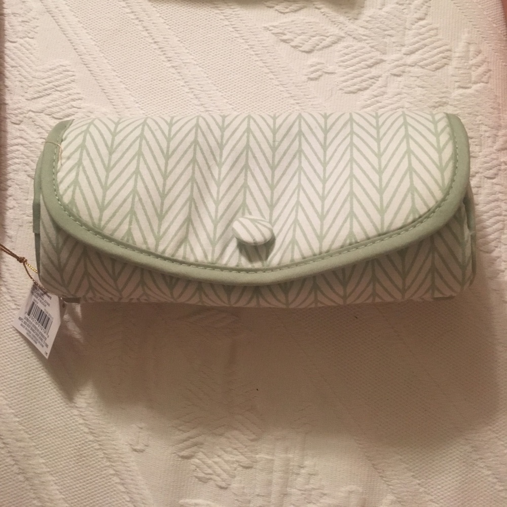 Green and white makeup bag