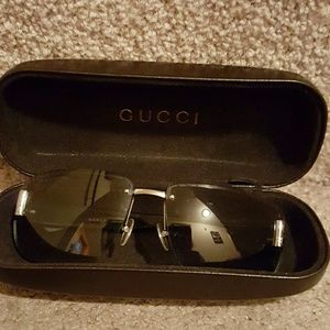Men's frame less Gucci shades w/black GG on arms