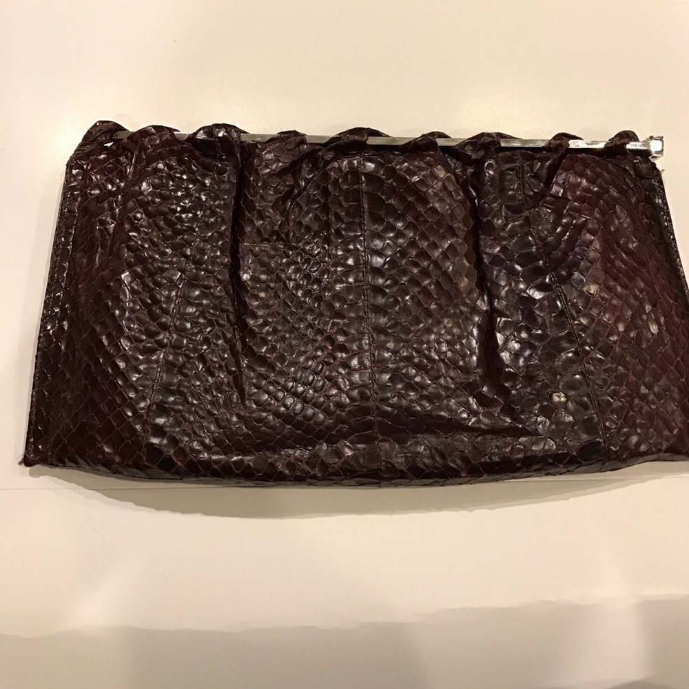 Like New Zenith genuine exotic burgundy clutch