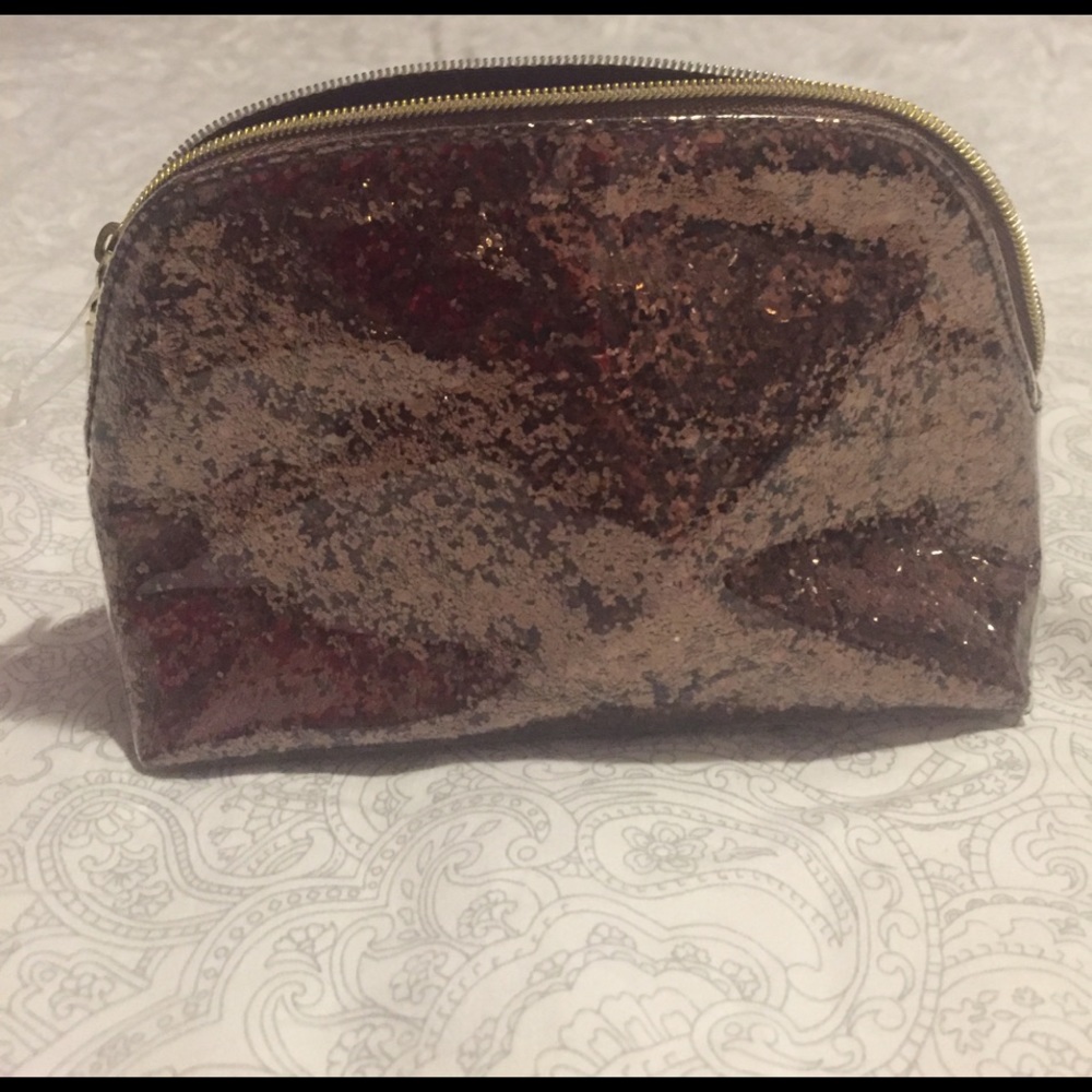 Small brown clutch/makeup bag