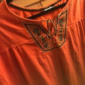 Embroidered orange top