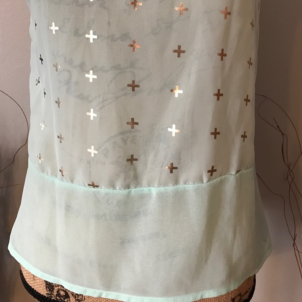 Sheer light green shirt