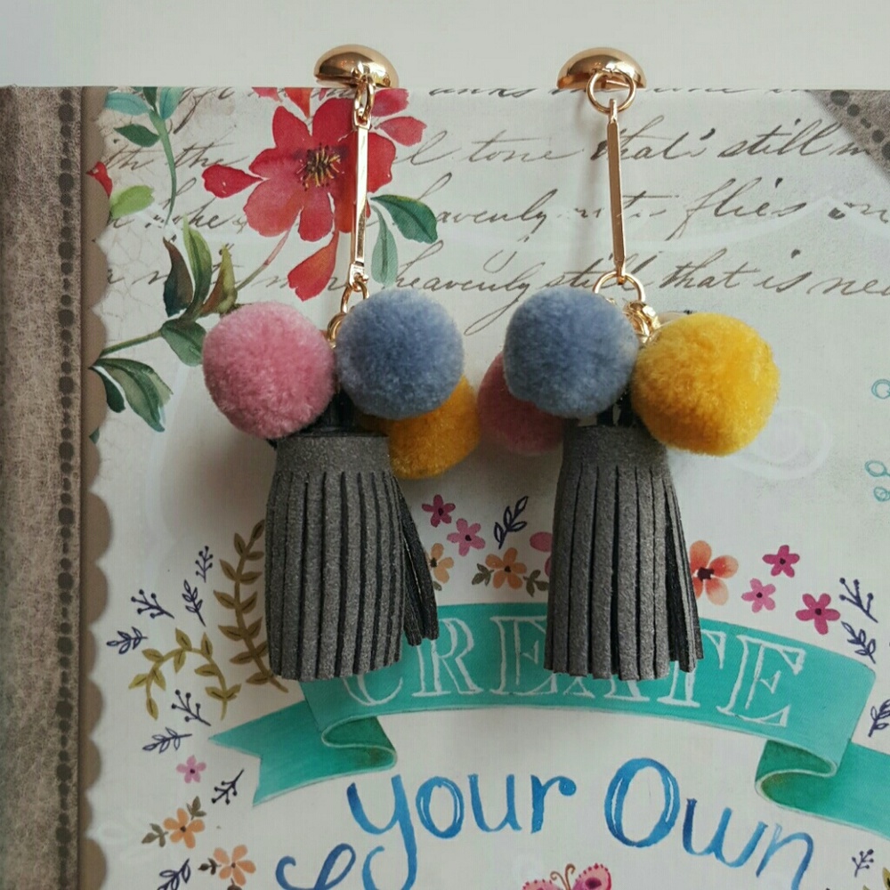 Pom pom & tassel earrings.